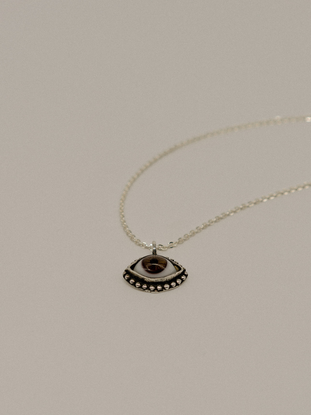 Brown Eye Pendant (With Chain)